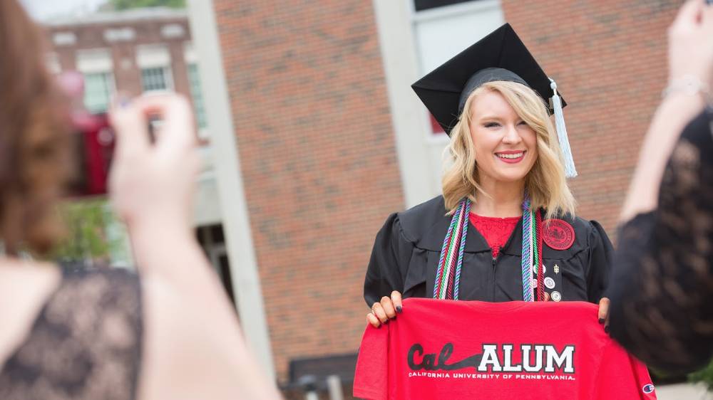 A PennWest California graduate during Commencement