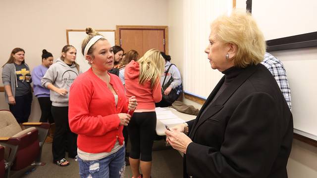 A PennWest California student discusses political topics at an ADP event.