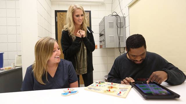 Professors help students with speech and hearing.